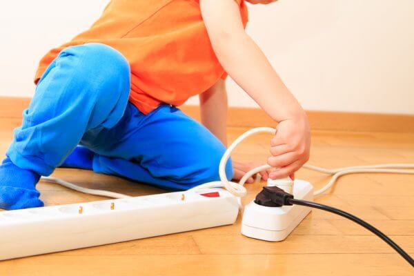 safety - child playing with circuit