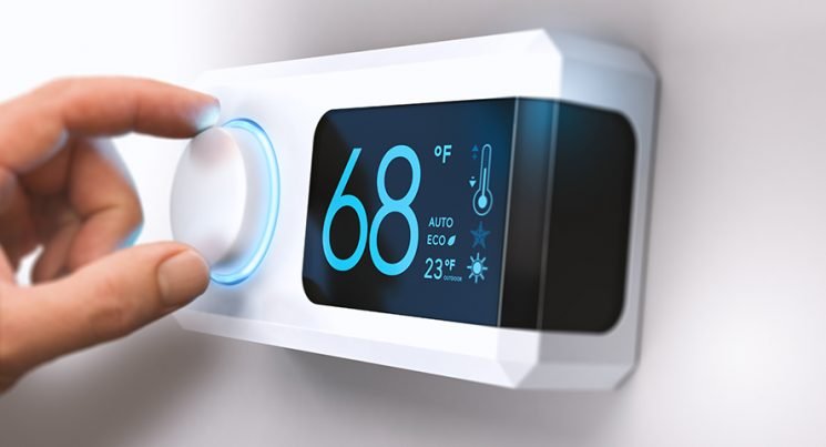 adjusting the thermostat