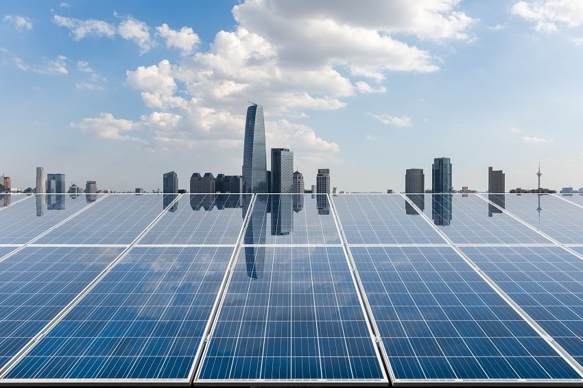 solar panels with city skyline